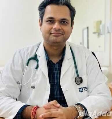 Dr. Manu Madan
